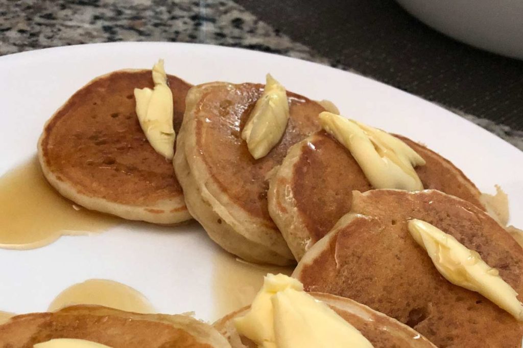 Fluffy pancakes on a plate.