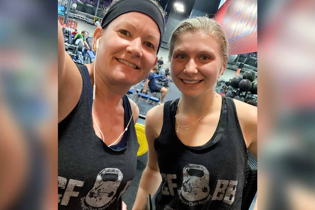 Tracie and her daughter at a CrossFit gym